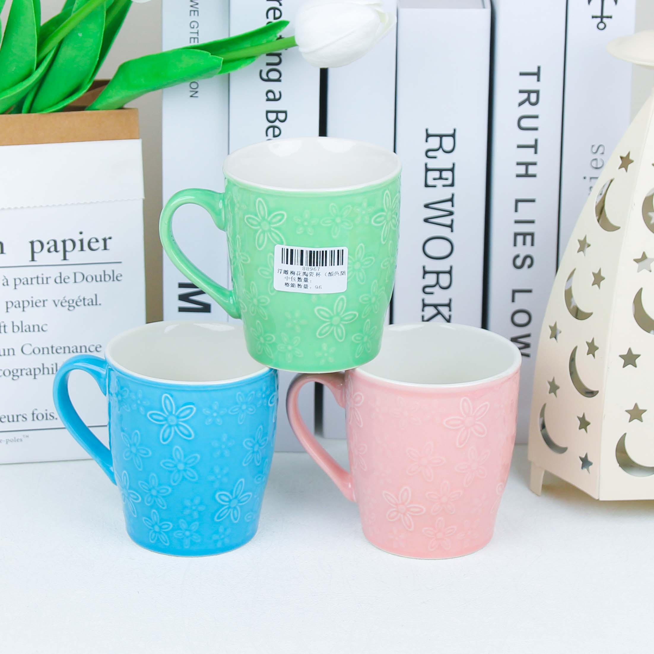 Embossed Plum Blossom Ceramic Cup (Random Color)