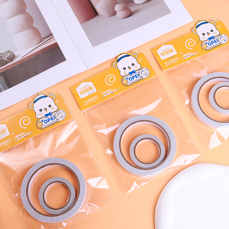 Boxed one large and one small double-sided tape