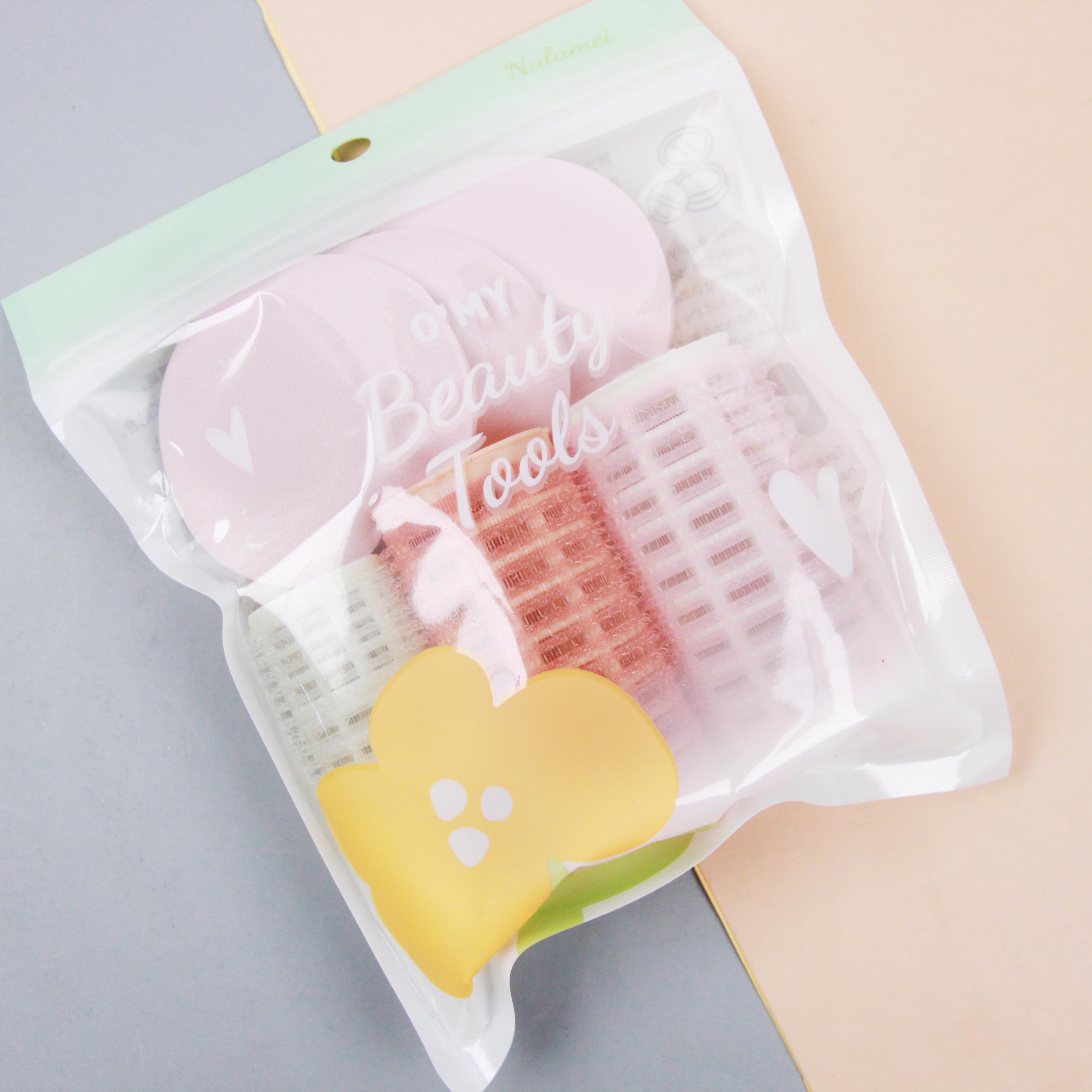 0017 Three curling irons + powder puff combination