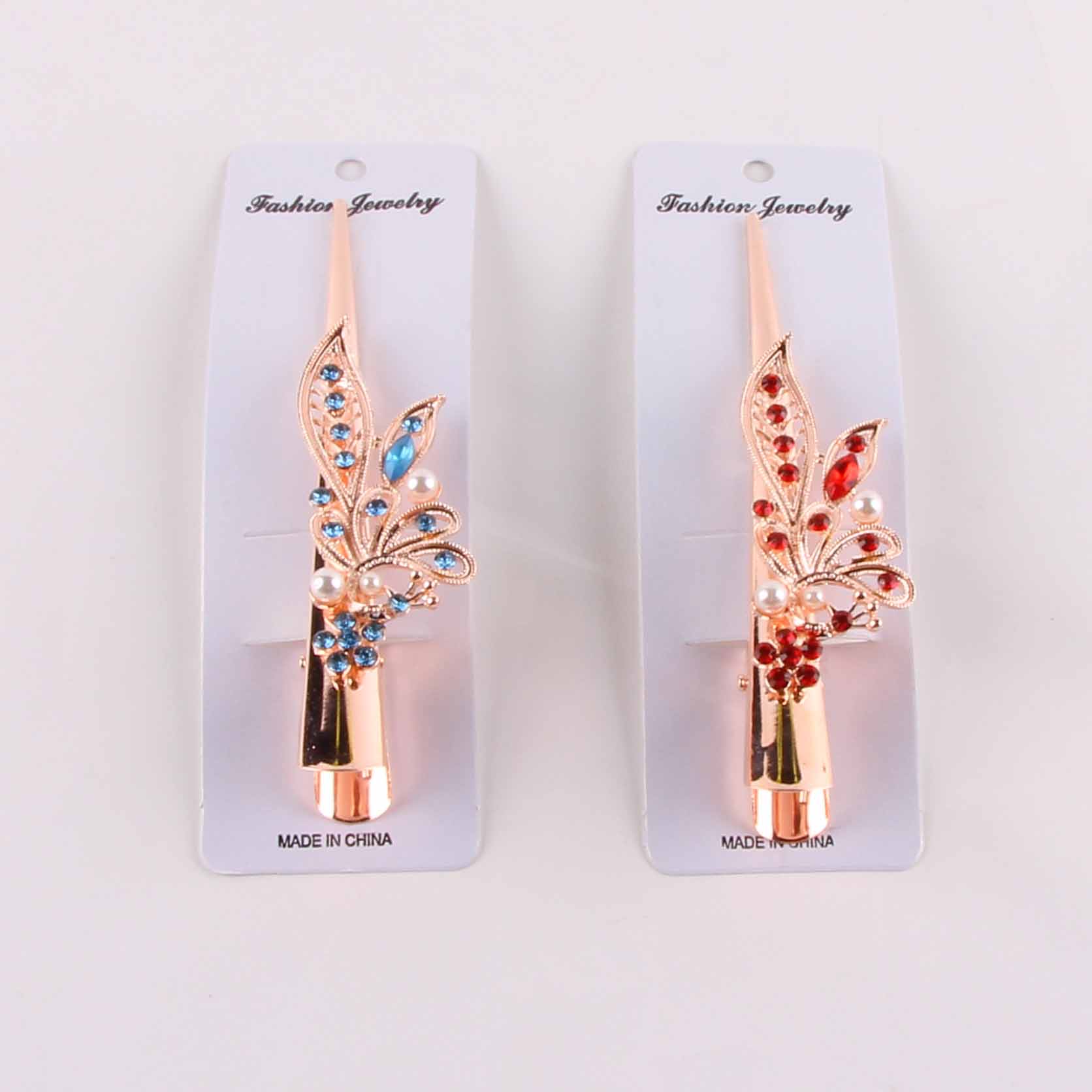 Kẹp tóc hình sừng bò đính ngọc trai và đá lấp lánh