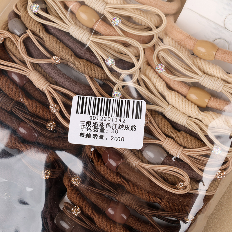 Three milk tea colored knotted rubber bands - Image 3