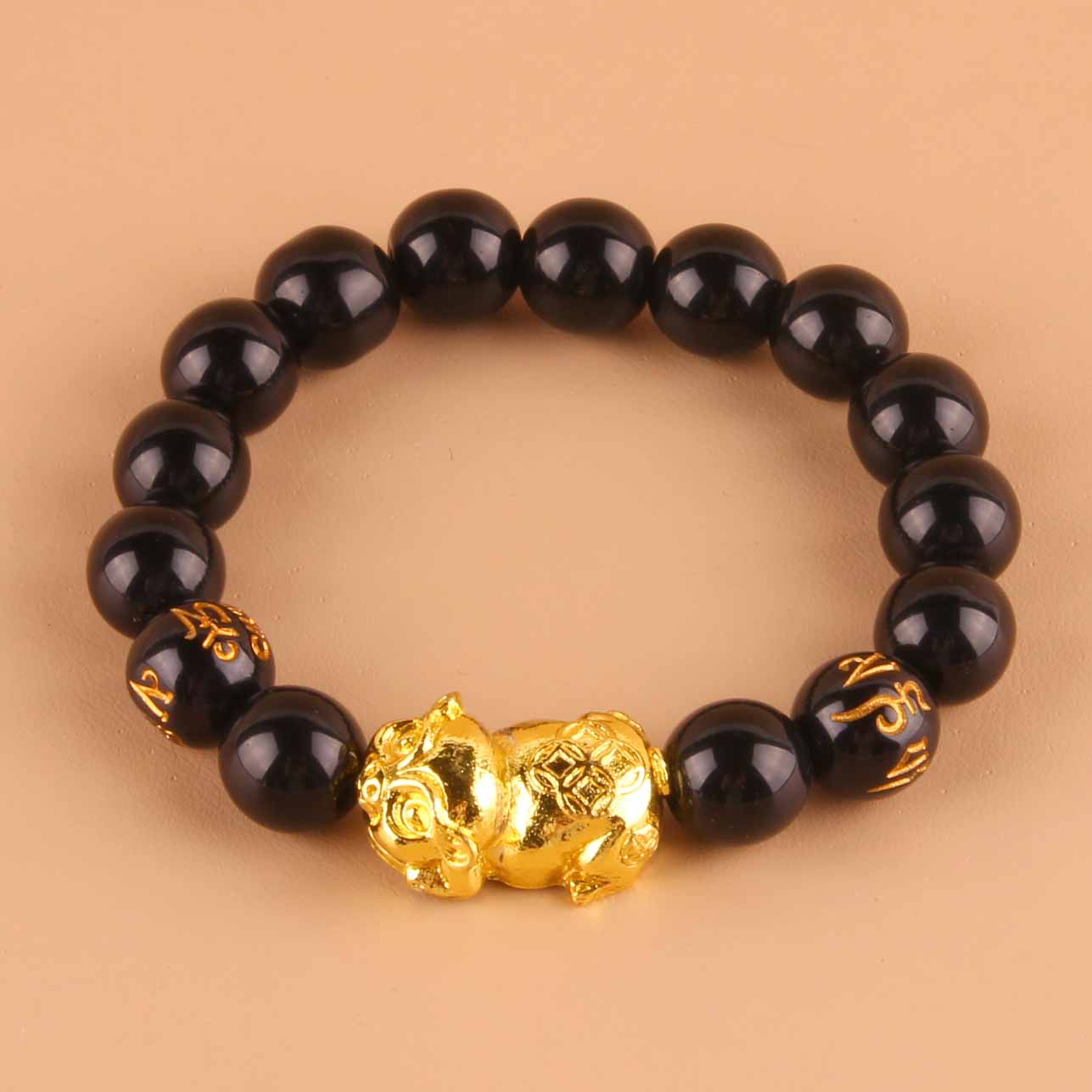 1.2 Vòng tay heo vàng hạt đen