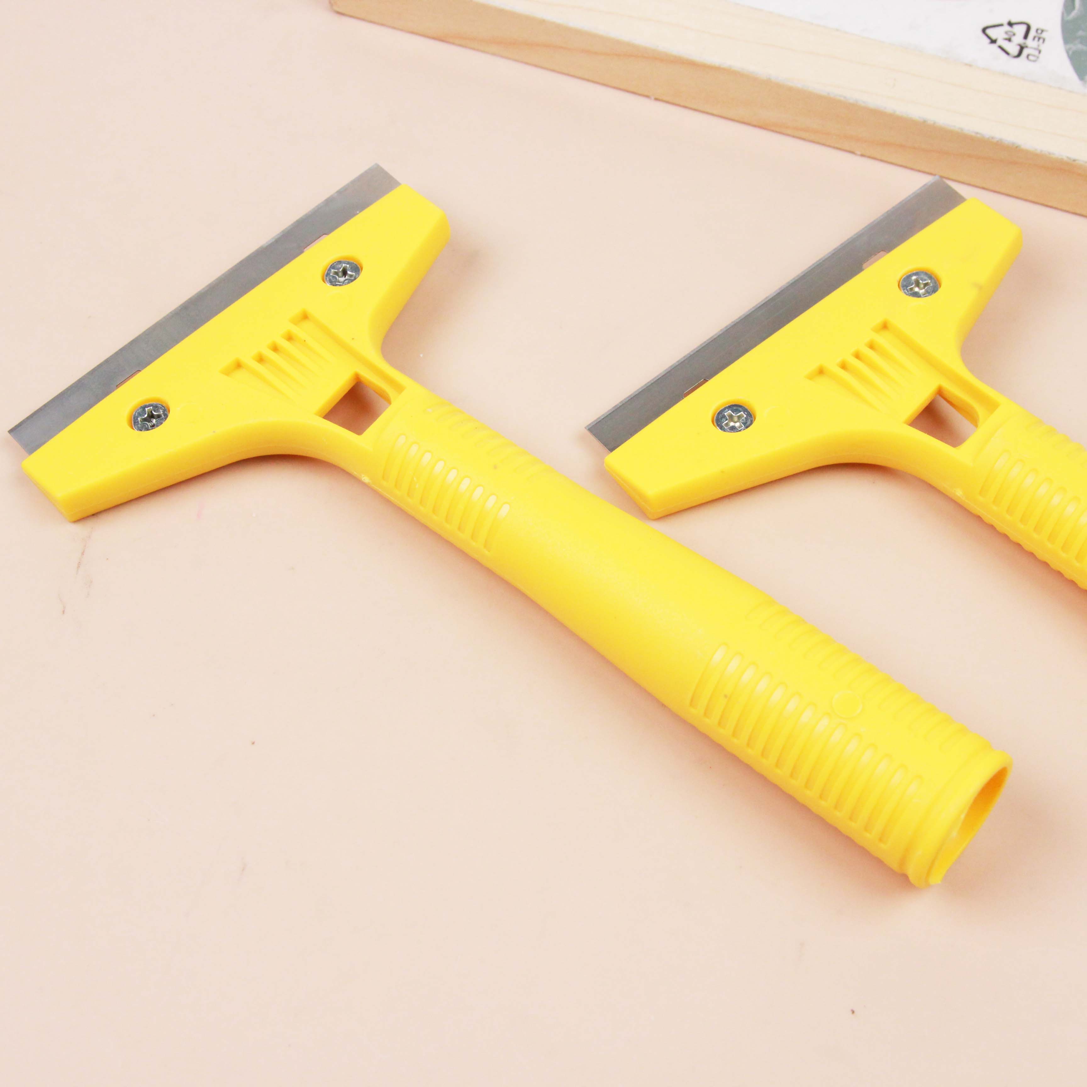 Yellow cleaning floor knife