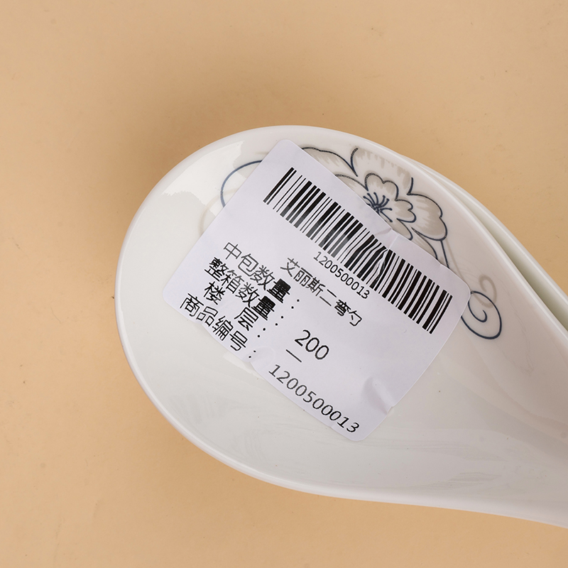 Alice two curved spoon