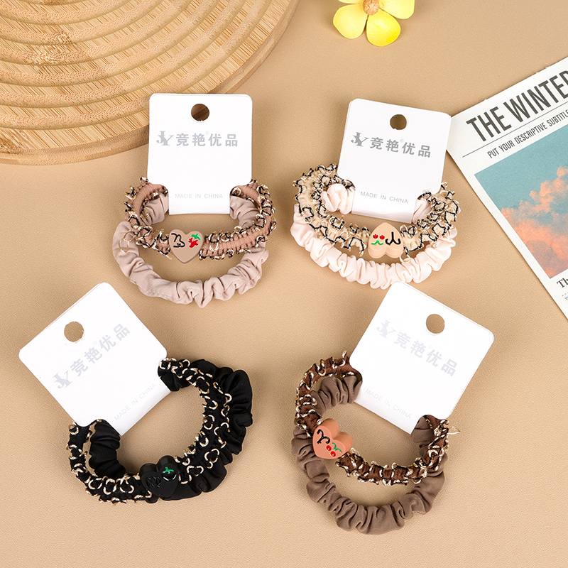 Two small intestine rings with peach heart lace in milk tea